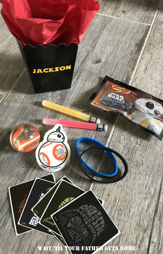 Star Wars treat boxes with DIY Light Saber glow sticks from #OrientalTrading via Wait Til Your Father Gets Home #ad #birthdayparties #treatboxes #partyfavors #StarWars #StarWarsparty #lightsaber 