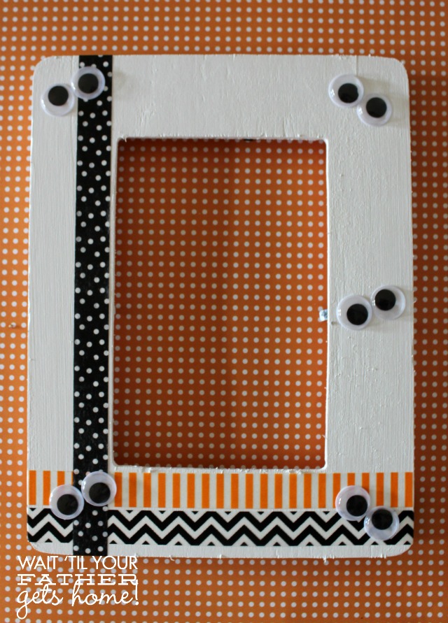 washi tape and googly eyes added to white photo frame
